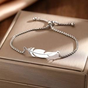 Adjustable silver feather pendant bracelet with box chain and bolo slider clasp