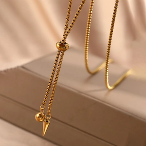 Adjustable gold box chain necklace with conical pendant and sliding bead for women