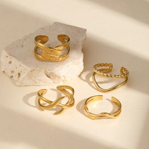 Geometric gold stainless steel adjustable ring set with diverse textured designs