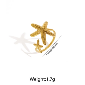 Detail shot of gold starfish open ring showing texture, 1.8cm diameter and 1.7g weight