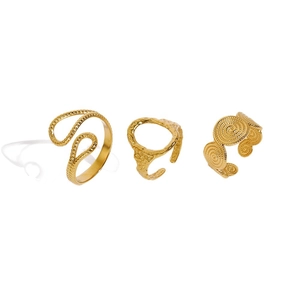 Three-piece gold stainless steel ring set with wavy, hammered, and spiral textures