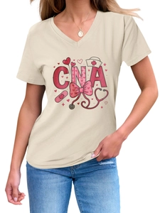 Detail of V-neck beige CNA t-shirt with nursing hat and heart stethoscope print