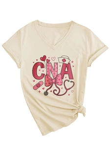 Detail of V-neck CNA scrub shirt with heart nursing print and stylish side knot design