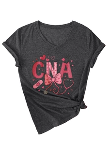 Detail of V-neck grey t-shirt showing CNA medical print and stylish side knot design