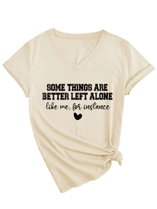 Detail of V-neck beige T-shirt featuring heart text print and stylish front knot design