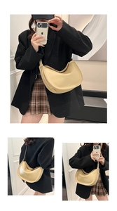 Detail view of stylish beige half-moon crossbody bag with smooth leather finish
