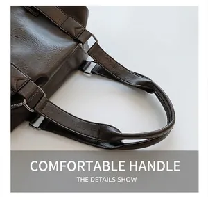 Detailed macro view of high-quality brown leather texture and metal D-ring attachment