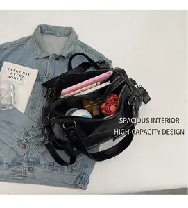 Internal view of spacious travel bag showing storage for tablet, umbrella and water bottle
