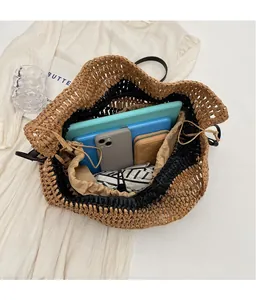 Detail view of woven tote interior showing spacious capacity for tablets and essentials