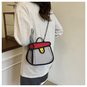 Detail of 2D cartoon style crossbody bag with comic red and yellow color-block design