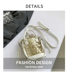 Detailed view of gold sequins on a bucket bag with white leather trim and a drawstring liner