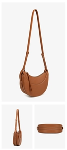 Detail view of brown crescent saddle bag with white contrast stitching and adjustable strap