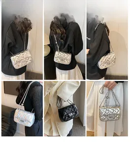 Chic quilted chain bag in silver laser and black finish shown in various styling poses