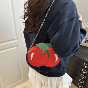 Creative cherry-shaped crossbody bag in red PU leather with green leaf and gold chain