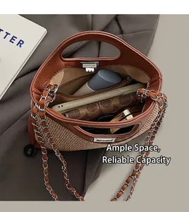 Interior view of the woven bucket bag showing its capacity and inner zippered pocket