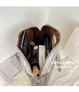 Spacious interior of silver matte tote bag showing laptop, umbrella, and essentials