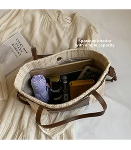 Spacious beige woven tote showing large capacity for umbrella, makeup and tablet