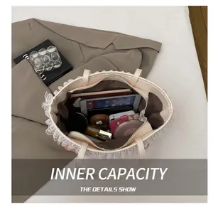 Internal view of the lace denim tote bag showing spacious capacity for daily essentials