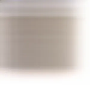 Detailed close-up of white canvas fabric with black polka dots and a bow print