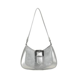 Silver crescent underarm bag with metallic finish and buckle detail on white background