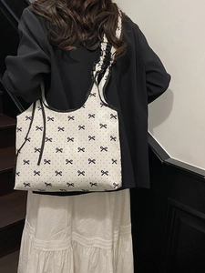 Polka dot canvas tote bag with bow prints and ruffle straps for women in casual street style
