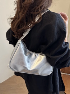 Minimalist metallic silver crescent underarm bag for women in stylish half-moon shape
