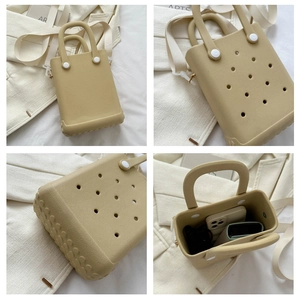 Detailaufnahmen der beigen Jelly-Strandtasche mit Textur, Bodenhaftung und Innenraum