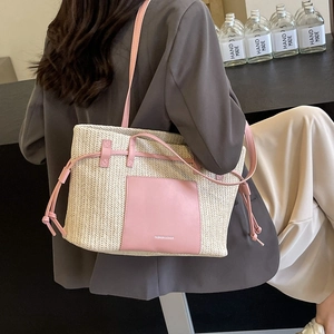 Straw tote bag with pink leather trim for beach vacations and large capacity commuting