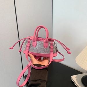 Chic pink rhinestone mini handbag with drawstring closure and crossbody strap