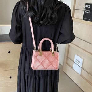 Pink quilted PU leather crossbody tote bag with woven handle and gold hardware detail