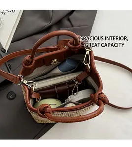 Top view showing the spacious inner compartment of the woven straw bucket bag