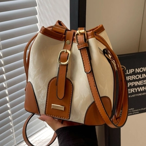 Damen Kontrastfarbe Beuteltasche Retro PU-Leder Kordelzug Umhängetasche Mode Spleißen Textur Crossbody Tasche Damen