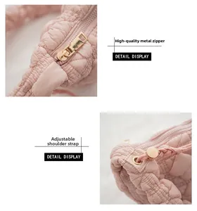 Detailed view of pink quilted cloud bag with premium gold zipper and elastic strap