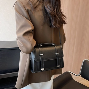 Minimalist black lychee texture leather shoulder bag with silver hardware for daily wear