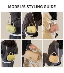 Gros plan sur le sac selle en cuir texturé avec fermoir crochet en métal et détails fins