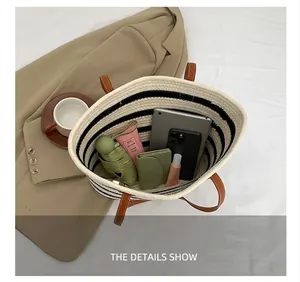 Interior view of striped woven tote bag showing spacious capacity for tablets and daily items