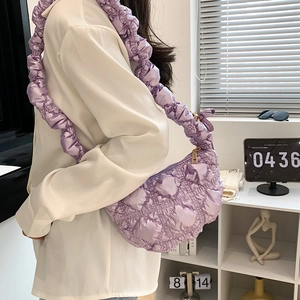 Chic lavender quilted shoulder bag with ruched strap and stylish puffer cloud design