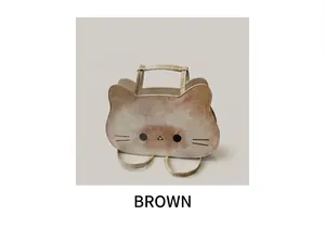 Detailed view of a cute cream kitten tote bag in brown with soft leather shoulder straps
