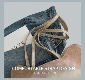Detailed macro view of the soft pink tote bag shoulder strap and opening construction