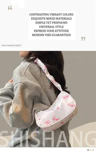 Floral shoulder bag with pink roses and red bows in a smooth satin texture