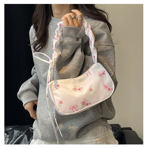 Floral shoulder bag with pink rose patterns and trendy ruched scrunchie strap design