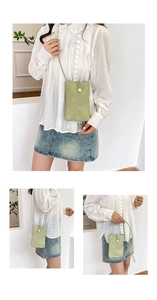 Detail of light green crossbody phone bag with minimalist pearl clasp and slim strap