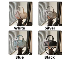 Detail of four colorful bowling bags with lace trim and pearl bow charms on a ledge
