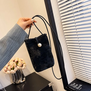 Elegant black velvet mini crossbody phone bag with pearl clasp and slim cord strap