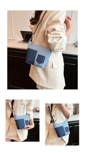 Detailansicht der Colorblock-Denim-Umhängetasche mit Kontrastnähten und silbernen Metallteilen