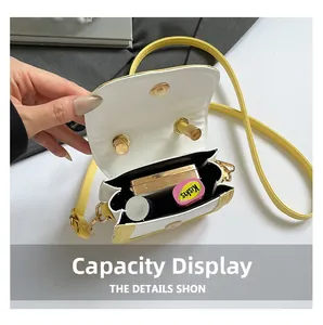 Top view of open yellow mini bag showing interior capacity with small personal items