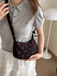 Cute black corduroy shoulder bag with red strawberry prints and wide strap