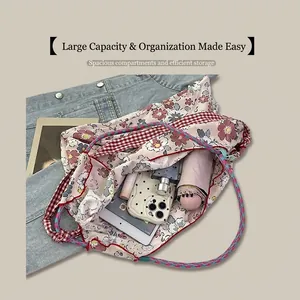 Floral canvas tote interior showing large capacity for umbrella, tablet and phone