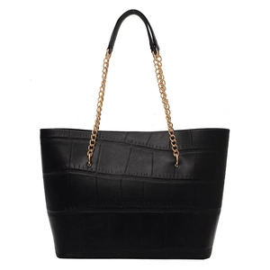 Minimalist black crocodile embossed leather tote bag with gold chain shoulder straps