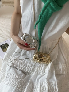 Chic 2025 metallic mini shoulder bag in gold and silver finish with elegant chain strap